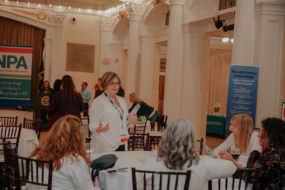 NHNPA member presenting and networking with colleagues at an NHNPA event